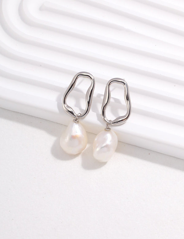 Baroque's alien pearl earrings