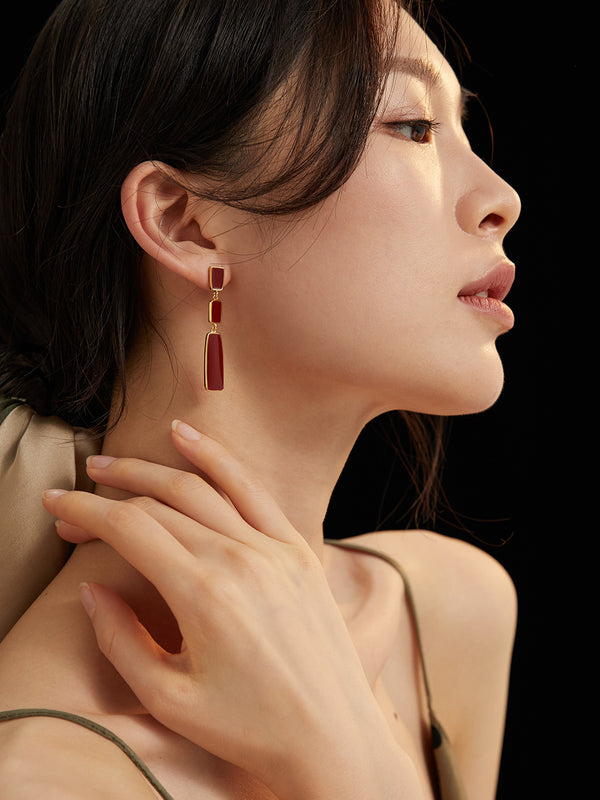 Red dripping earrings